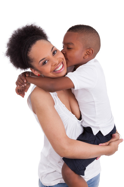 Litte black boy kissing her mother - Foto, immagini