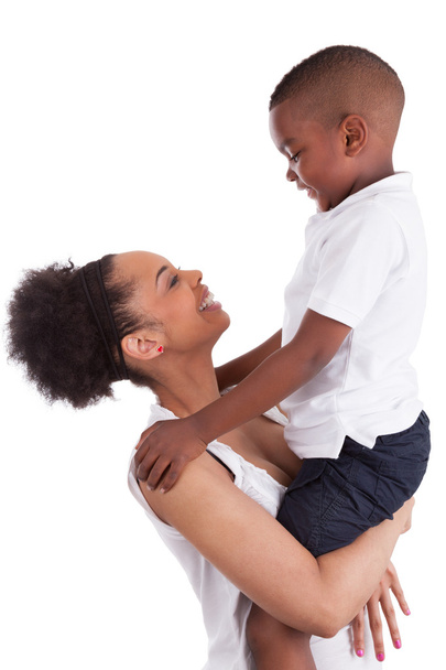 Litte black boy kissing her mother - Φωτογραφία, εικόνα