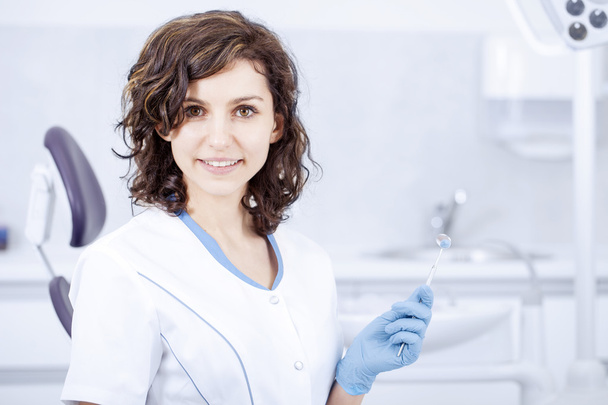 Young professional woman dentist in the dental office - Foto, Imagem