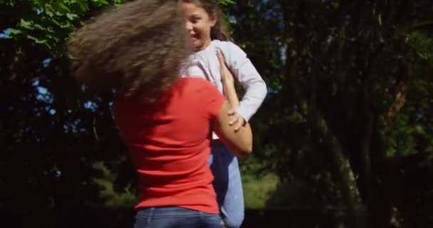 mother and daughter run to each other  - Footage, Video