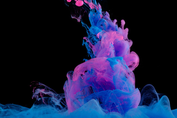 Blue pink clouds of ink in liquid  - Photo, Image