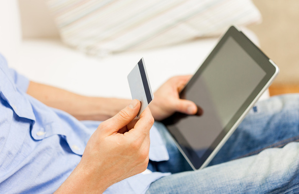 close up of man with tablet pc and credit card - Foto, Imagem