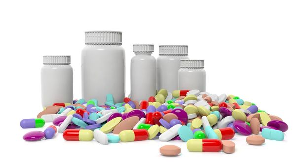 Různé barevné pilulky s lahví, izolovaných na bílém pozadí. - Fotografie, Obrázek