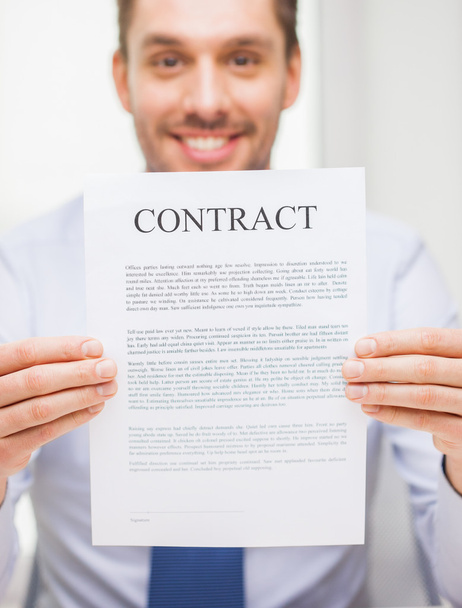 close up of businessman holding contract document - Фото, зображення