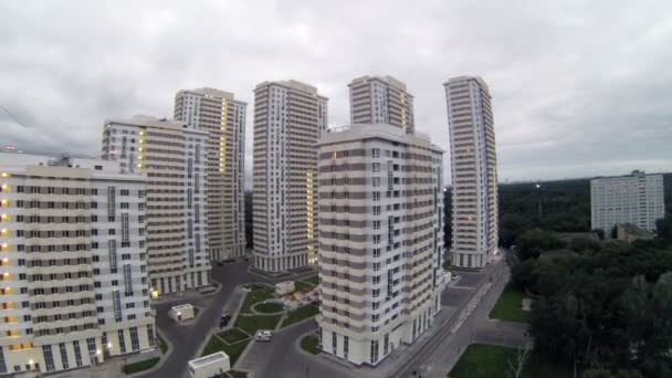 Housing estate stands near trees - Footage, Video
