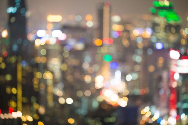 Blurred background modern city lights and office buildings, Bangkok Thailand - Photo, Image