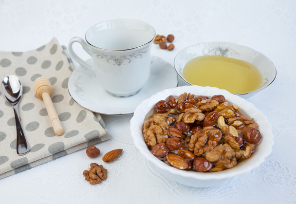 Honey,nuts and cup - Fotoğraf, Görsel