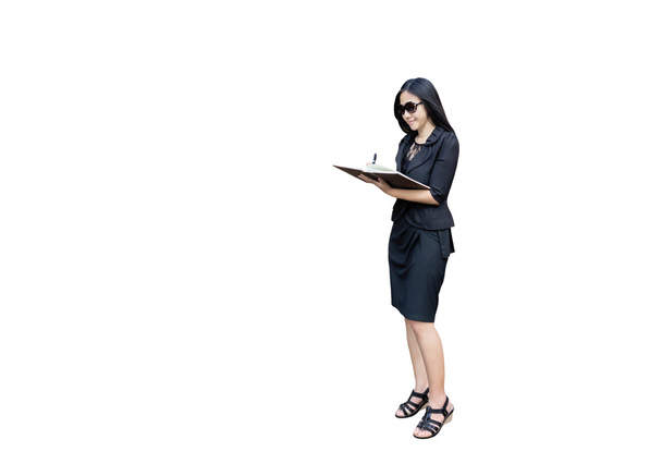 Isolated Asian business women standing and writing down - Foto, Imagen