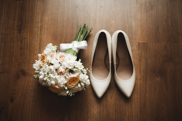 Wonderful luxury wedding bouquet with shoes of different flowers - Foto, Imagen