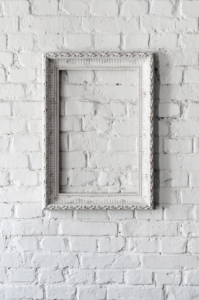 Blank frame on a white wall - Photo, Image