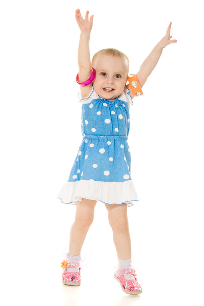 Little girl raised her hands up - Foto, Imagem