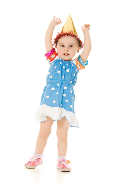 The little girl in hat is dancing - Фото, зображення