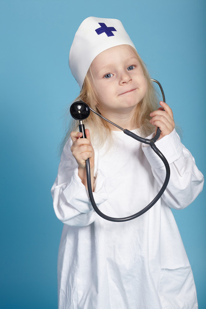 little funny girl playing nurse - Foto, Bild