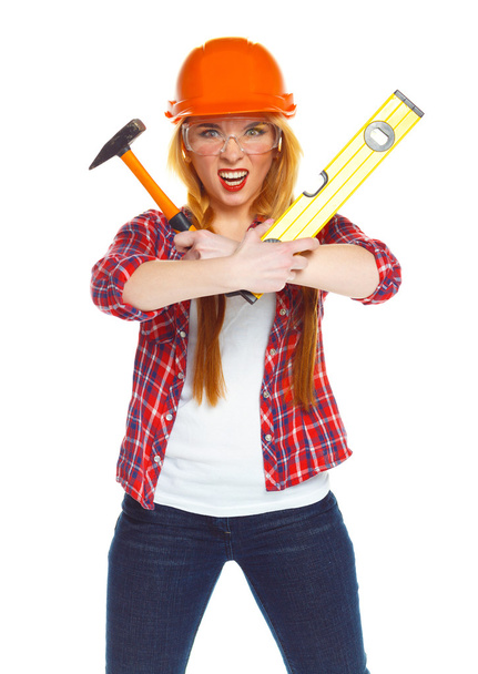 Jeune femme en casque avec les outils de travail sur un blanc
 - Photo, image