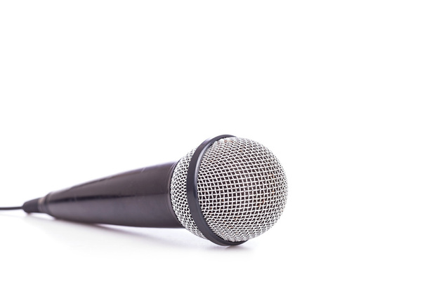 Close up old microphone isolated on white  - Photo, image