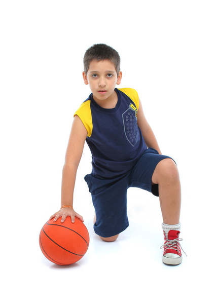 Boy playing basketball isolated - Fotó, kép