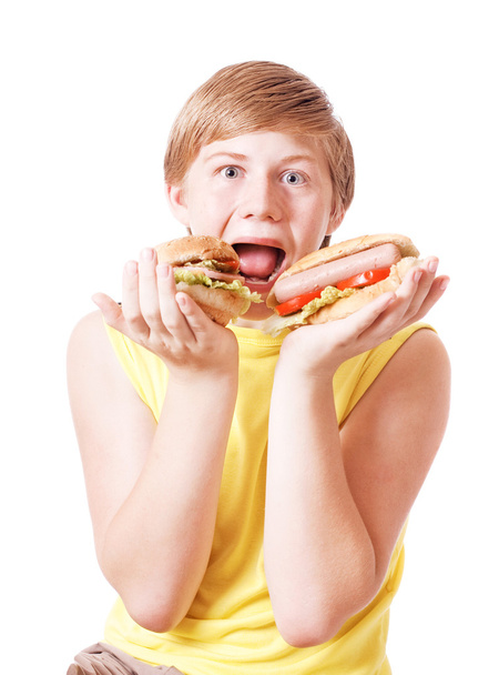 Funny boy with fastfood - Foto, afbeelding