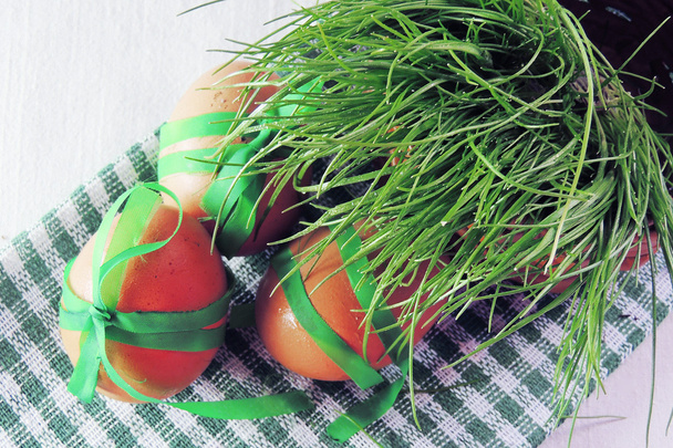 Chicken eggs and green grass on white background - Photo, Image