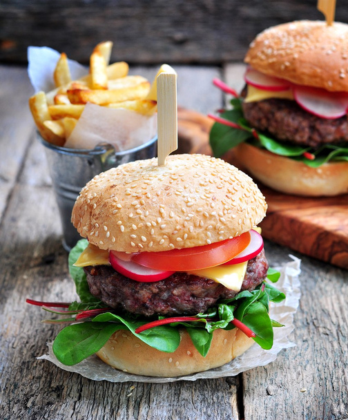 Homemade beef burger with vegetables and french fries. - Fotoğraf, Görsel