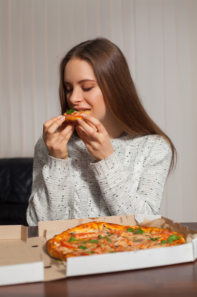 Woman with pizza - Фото, зображення