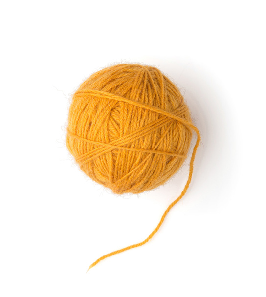 Una bola de lana amarilla
 - Foto, Imagen