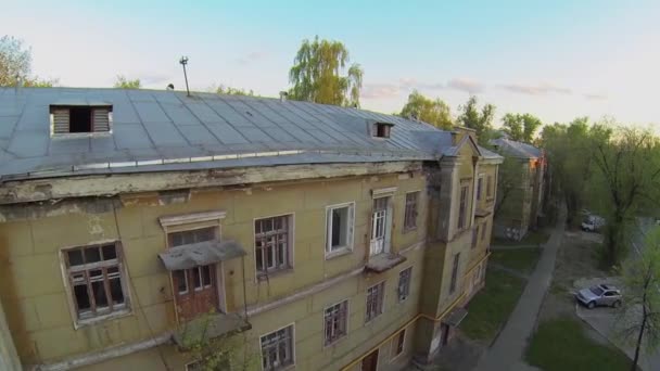 Ruinous houses among trees - Footage, Video