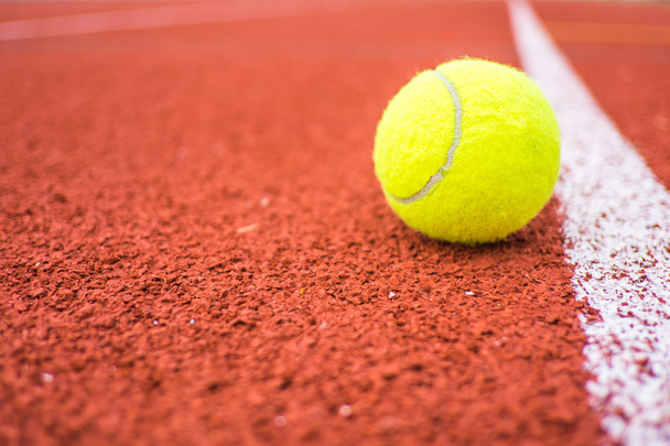 Tennis ball on a stadium - Foto, Imagen