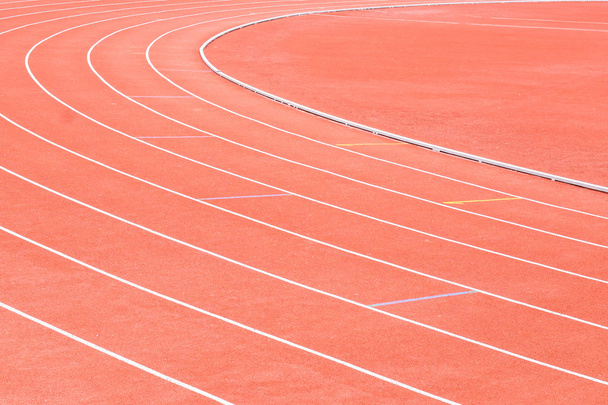 Бігова доріжка на стадіоні
 - Фото, зображення