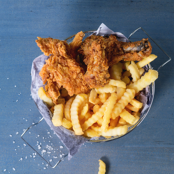 Chicken fries with fried potatoes - 写真・画像