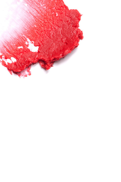rode lippenstift beroerte (voorbeeld), geïsoleerd op wit - Foto, afbeelding