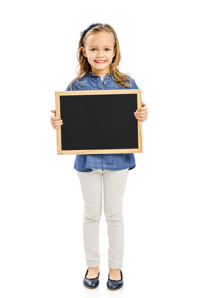 Girl holding a chalkboard - Foto, afbeelding