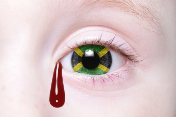 μάτι του ανθρώπου με την εθνική σημαία της Τζαμάικα - Φωτογραφία, εικόνα