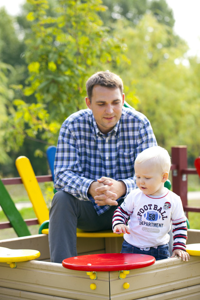 Father with two year old son on the playground - Foto, Imagen