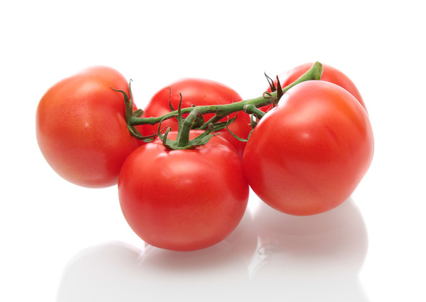 Tomatoes on wite. - 写真・画像