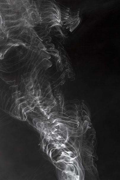 smoke swirling on a black background - Photo, Image