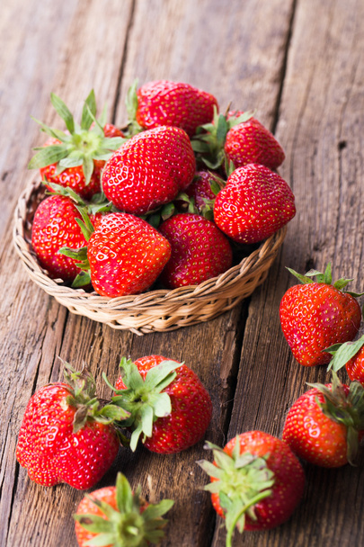 Fresh red strawberries on old wooden background - Photo, Image