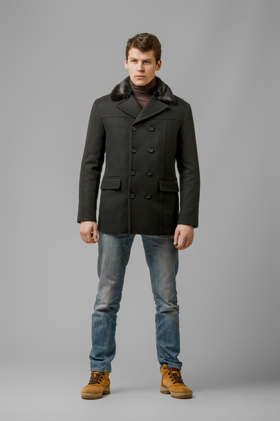 handsome man in a coat - Photo, Image