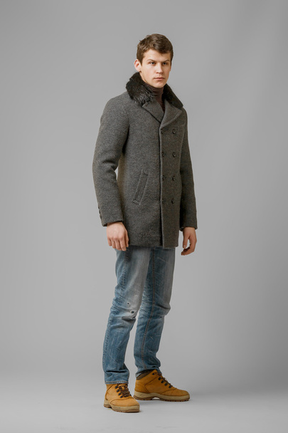 handsome man in a coat - Fotoğraf, Görsel