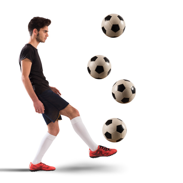 Joueur de football adolescent avec des ballons de football
 - Photo, image
