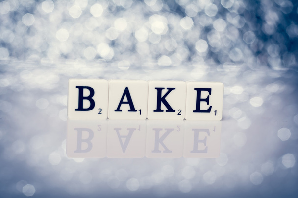 Written word of tiles with letters - bake - Photo, Image