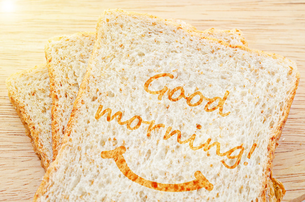 Good morning greeting on toasted bread wheat. - Photo, Image