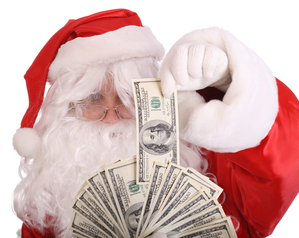 Santa Claus holding money. - Fotoğraf, Görsel