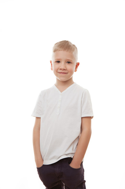Young pretty boy posing at studio as a fashion model on   white background - Foto, Imagen