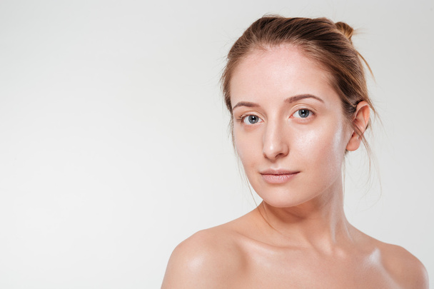 Woman with clean skin looking at camera - Foto, Bild