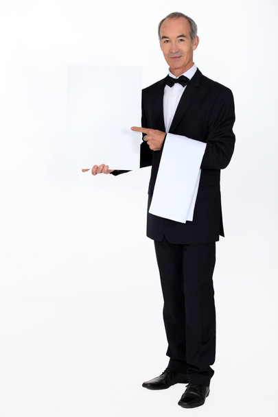 Waiter with a blank menu - Foto, afbeelding