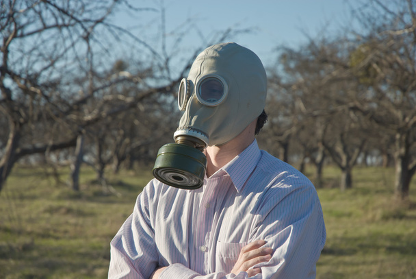 Man wearing gasmask - Фото, изображение