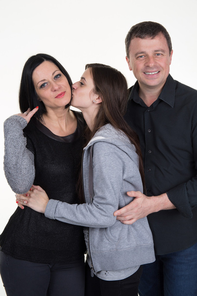 Sorrindo família feliz com a filha adolescente juntos
 - Foto, Imagem