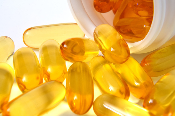 Cod liver oil omega 3 gel capsules on white background - Photo, Image