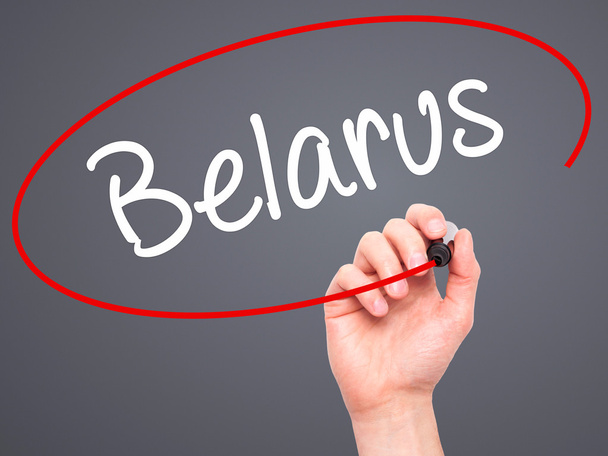 Man Hand writing Belarus  with black marker on visual screen. - Photo, Image