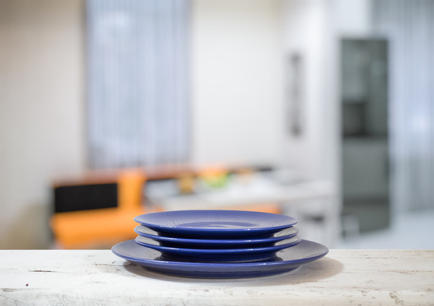 plates on white table - Photo, Image
